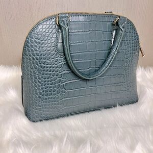 NEW WITHOUT TAGS Target snake skin purse teal colored